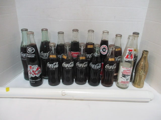Collection of Vintage Coca-Cola International Bottles, Alabama and Georgia: Bottles, Brass Collector's Bottle, Calendars, etc., some are empty, most are unopened, see pictures and preview