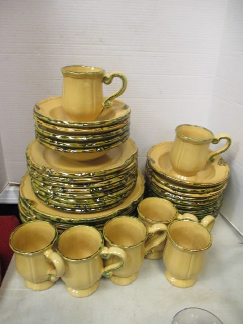 39 Pieces of Casa Del Sol (Portugal) Stoneware Pottery Dishes: (7) 12 1/4" plate, (8) 10" plate, (15) 8" bowl, and (7) 5" mugs, crazing