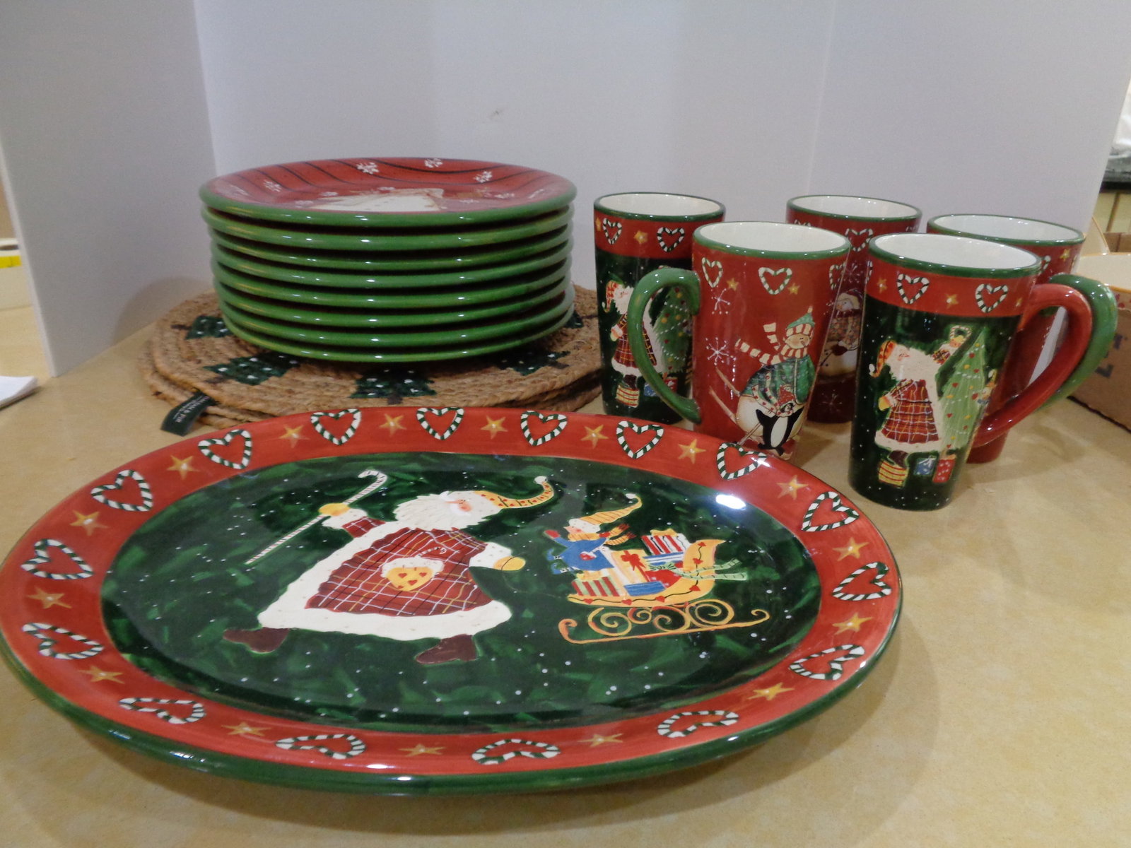 Snow Mate Christmas lot: 8 Plates 11 in, 1 platter 18 in Tall mugs 6 in , placemats