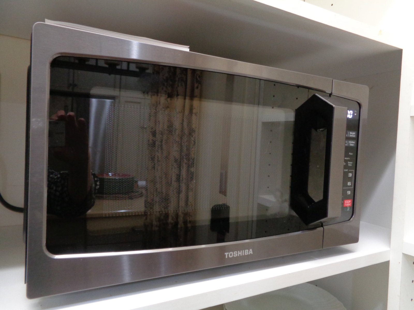 Toshiba Microwave: purchased 2026 has manual, needs cleaning 9 1/2 x 18 x 12 1/2 deep