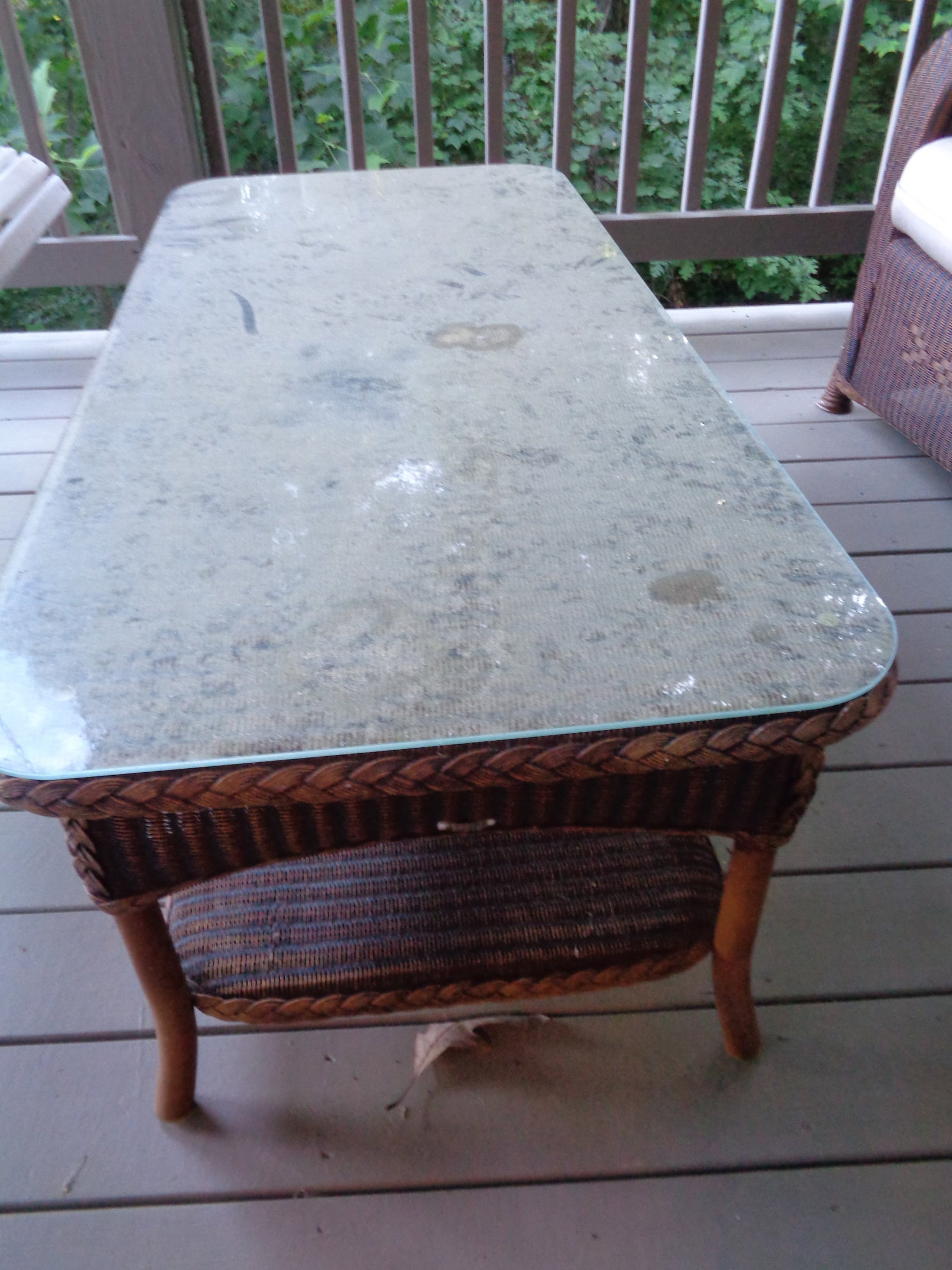 Plastic Wicker Weave Table with glass top: 18 x 49 x 23