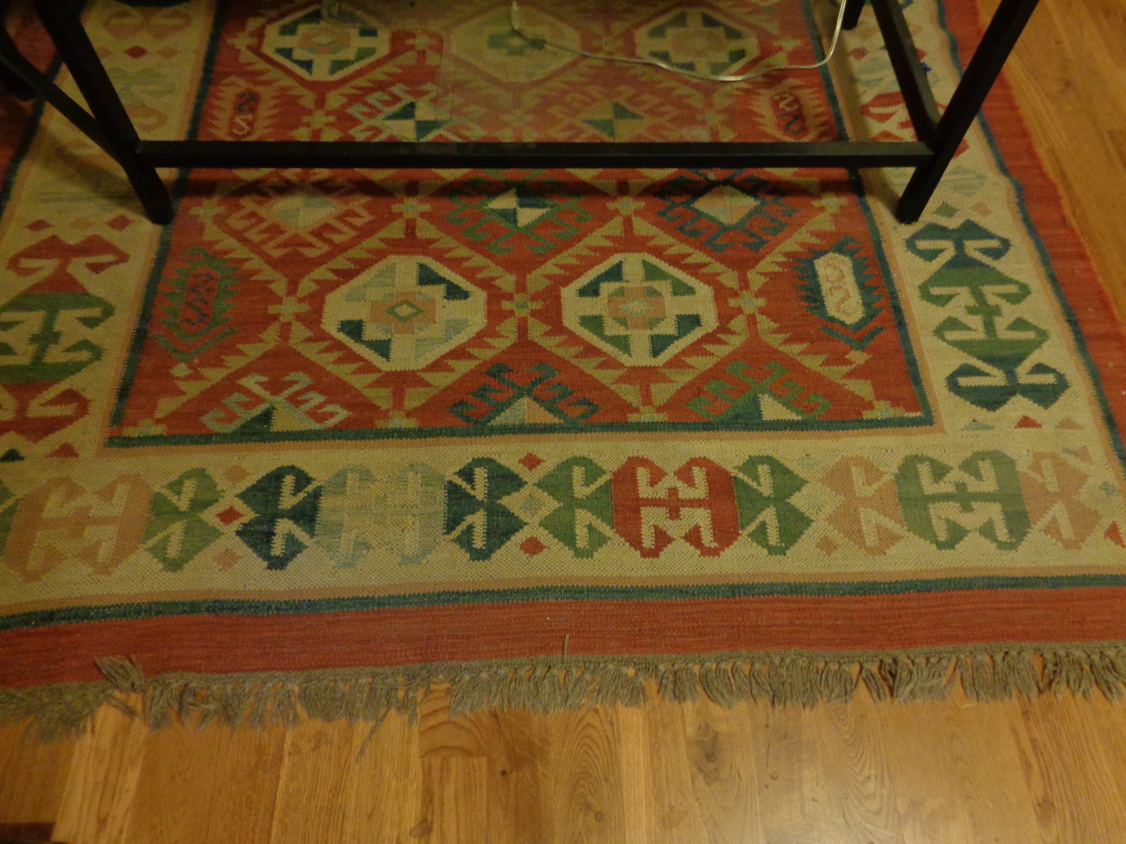 65x93" Rug: some wear and damage edges
