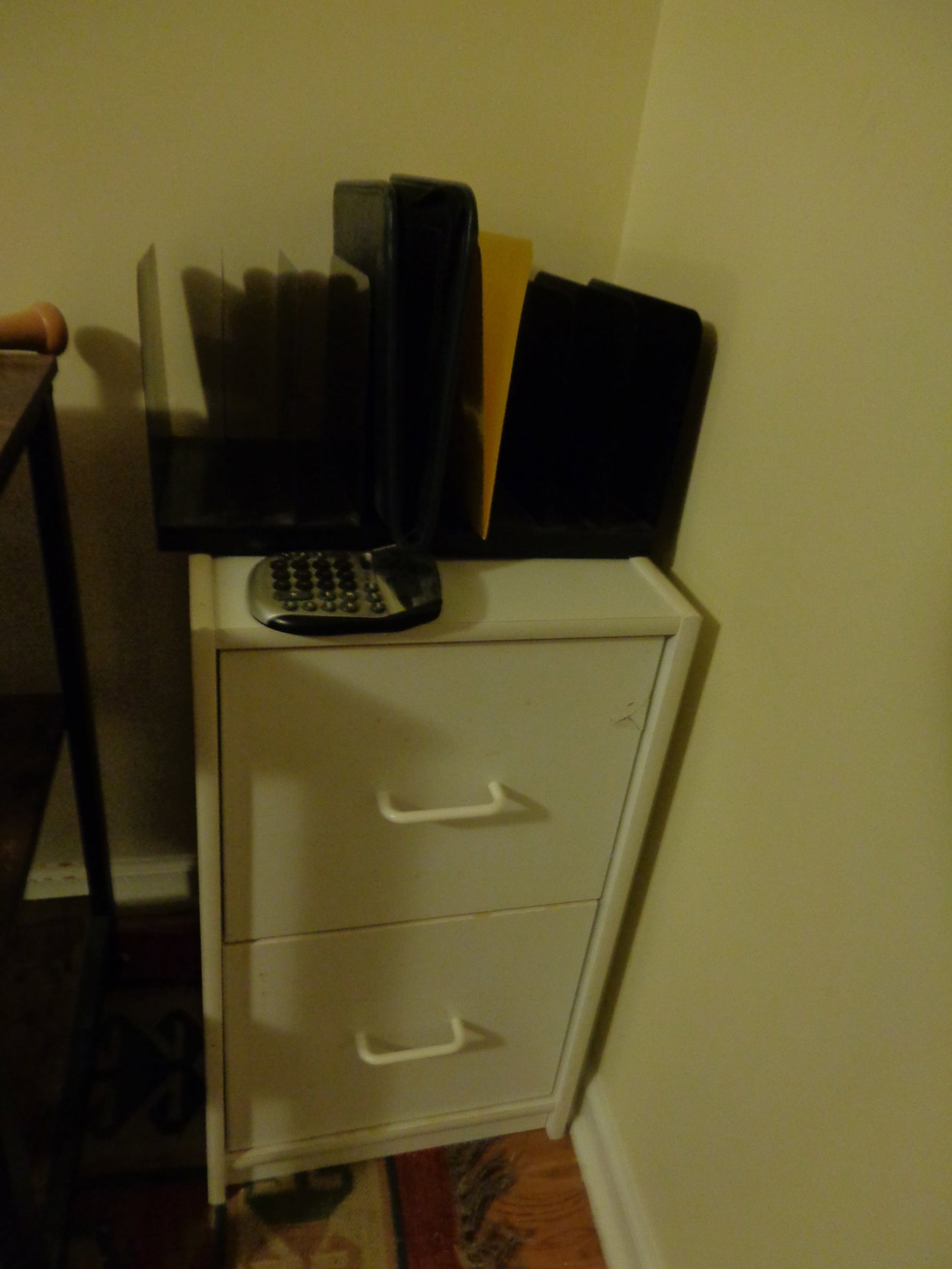 Office Lot: File cabinet 26Tall 15 1/2 wide 14 in deep, Metal file holder, Calculator, some damge to file cabinet see photos