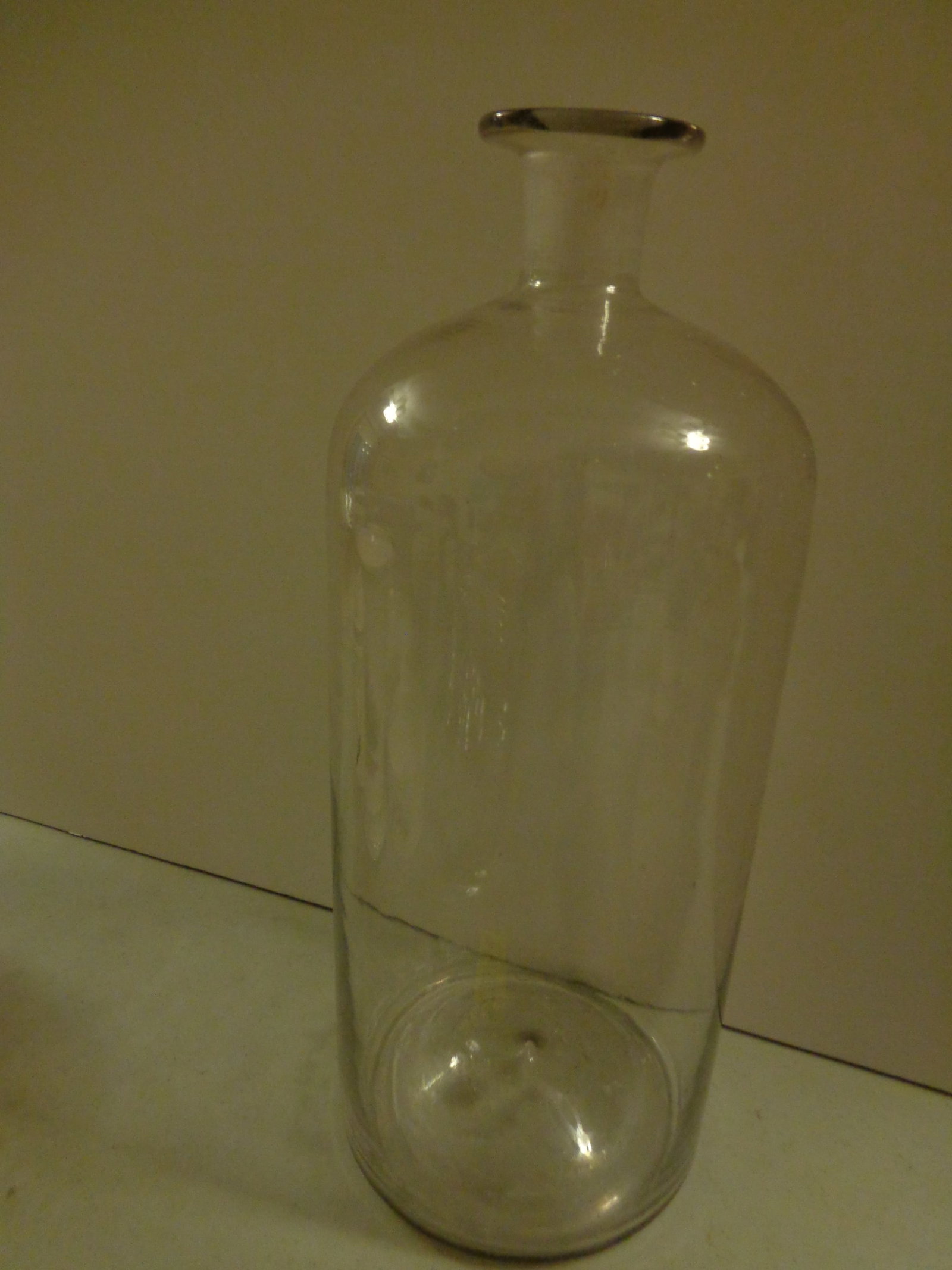 Clear hand blown Bottle: 11 inches