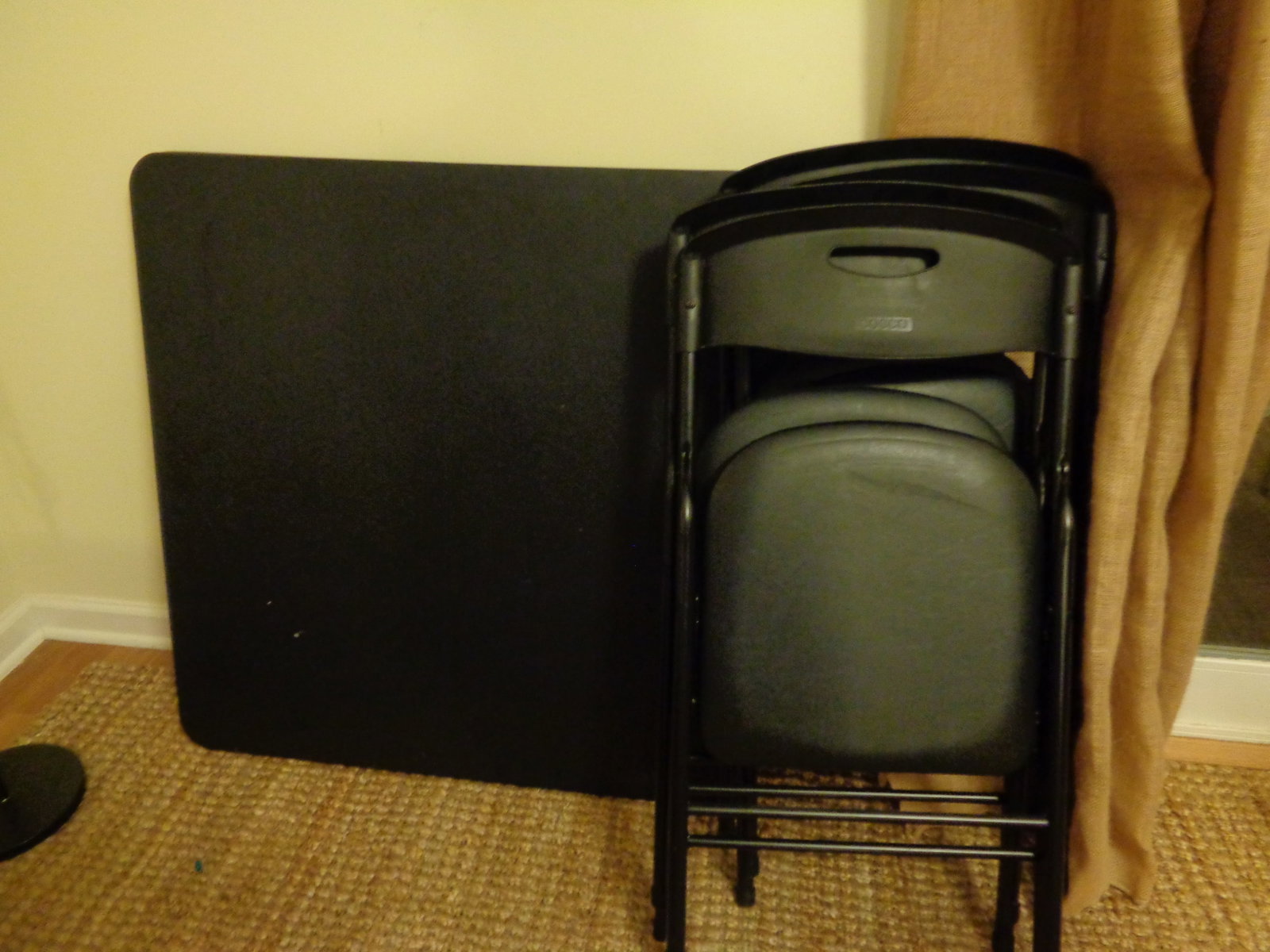 Cosco Black folding table & 4 Folding Chairs: .