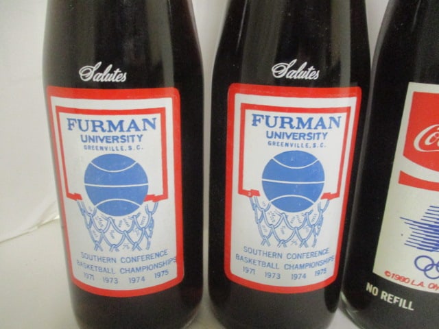 Grouping of 7 Unopened Commemorative Coca-Cola Bottles - Furman, Olympics, - 2