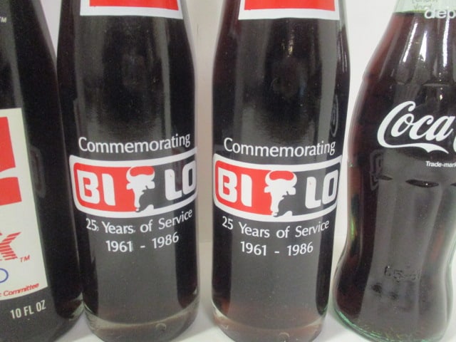 Grouping of 7 Unopened Commemorative Coca-Cola Bottles - Furman, Olympics, - 4