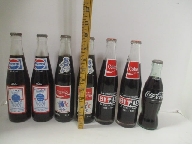 Grouping of 7 Unopened Commemorative Coca-Cola Bottles - Furman, Olympics, - 9
