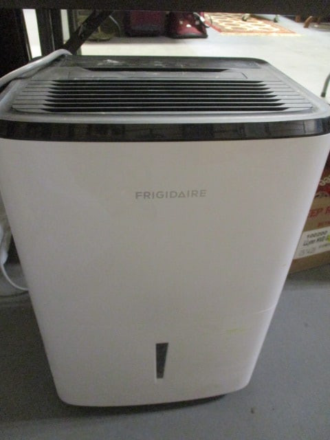 Frigidaire Gallery Portable Dehumidifier - Model #FFAD5033W1: 16" x 24 1/2", with instruction booklet, powers on