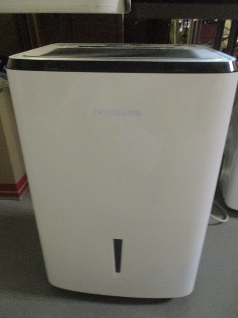 Frigidaire Gallery Portable Dehumidifier - Model #FFAD5033W1: 16" x 24 1/2", powers on