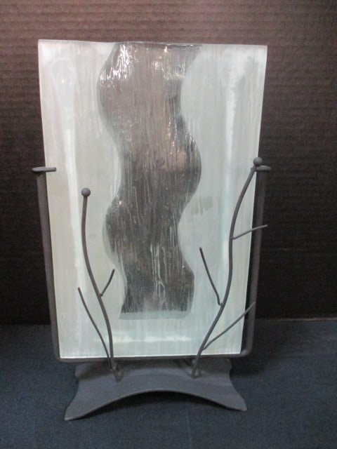 Contemporary Modern Art Glass Tabletop Sculpture Vase in Black Metal Twig Look Stand: 8 1/2" x 3 1/4" x 14", back side of glass is cracked-see pictures and preview