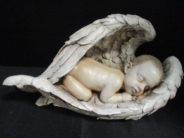 Napco Sculpted Baby Sleeping in Wings of an Angel: approx. 15" long