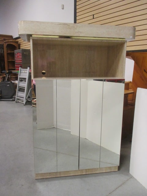 Postmodern Faux Travertine Laminate Waterfall Design: and Gold Accent Band. 42 1/4" x 18" x 57 3/4", one adjustable shelf, made in Brazil, Local Pickup Only