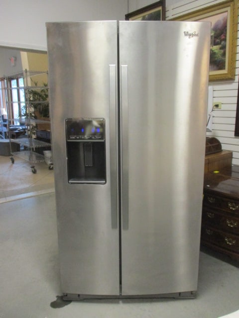 Whirlpool Stainless Side x Side Ice/Water in Door Refrigerator: Model WRD950SIAM01, Serial #HR43119433, DOM 08/2014, 35 1/2" X 32"(34 1/2" including handles) x 68 3/8"(including hinges), Icemaker does not work and needs light bulbs on freezer side, Freezes and coo