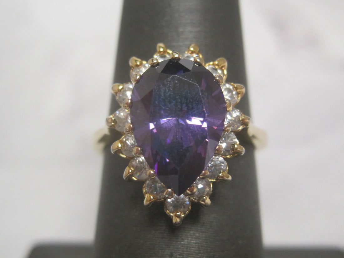 Amethyst Gold on Sterling Silver Ring: Weighs 4.8 grams, Size 7, Stunning pear shape gem surrounded by CZ