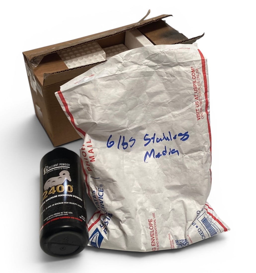 6.9 Lbs. of Various Powder and Styrofoam Cases - NO SHIPPING: 6.0 lbs. of Stainless Media powder, 0.9 Lbs. of Smokeless Magnum Handgun Powder by Alliant, and various marked and unmarked styrofoam cases for ammunition