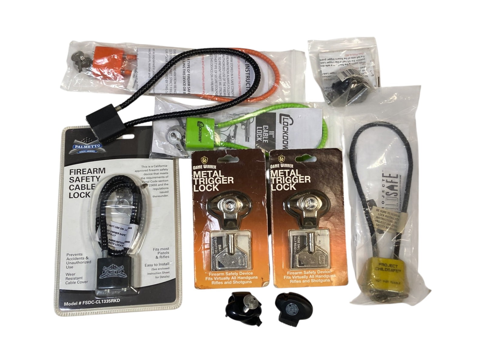 Lot of Various Gun Locks - Many New: See photos for what’s all here. Good brands