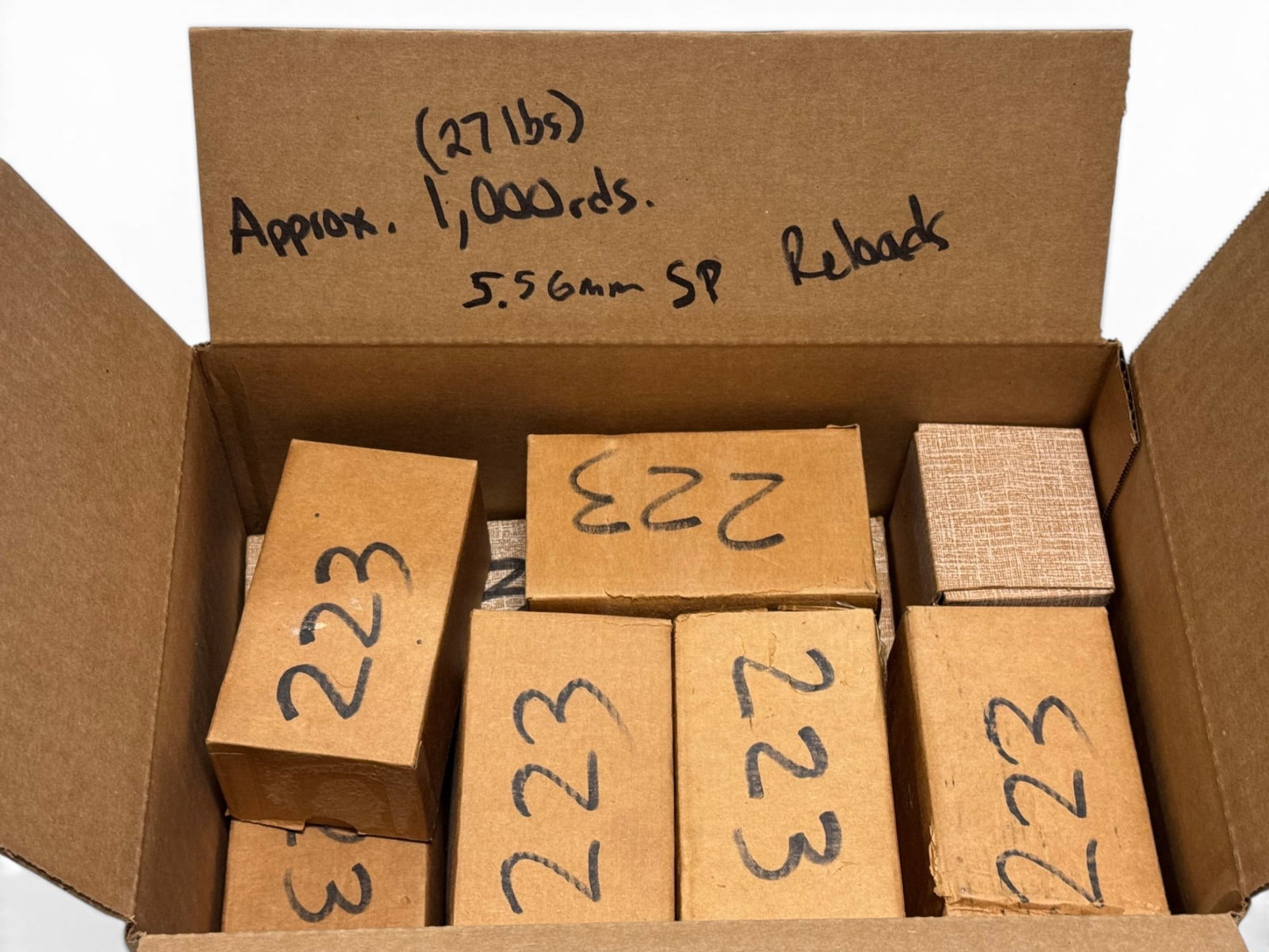 Approximately 26.6 Lbs. Of 5.56mm SP Reloaded Ammunition (1 of 4)