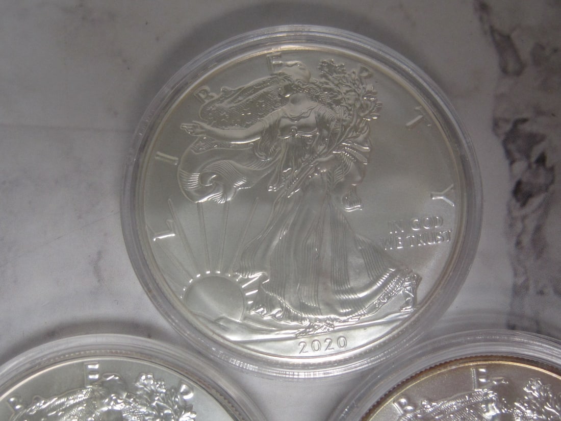 Lot of 5 UNC. American Eagle One Ounce Fine Silver Dollars - 2