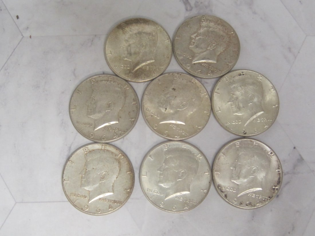 Lot of 9 1964 Kennedy Half Dollars: .