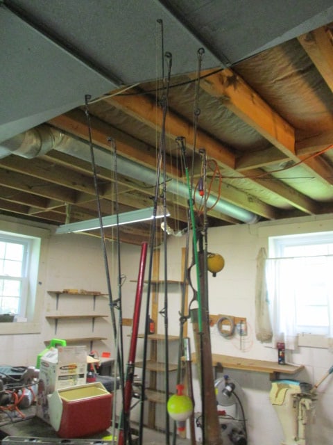 Fishing Rod Holder Filled with Nice Rods and Reels - 7