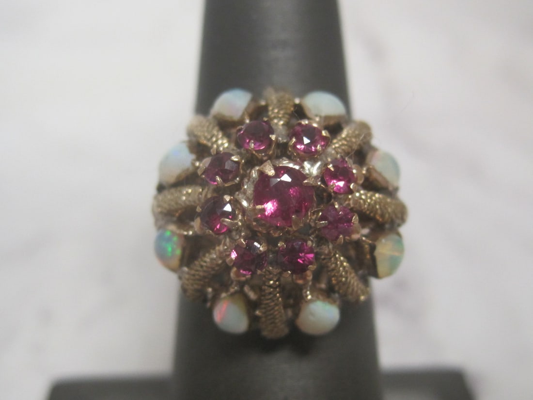 14k Gold Opal & Ruby Princess Ring: Weighs 4.9 grams, Size 6 1/2, Large dome style with 8 fiery teardrop shape opal & 9 round rubies