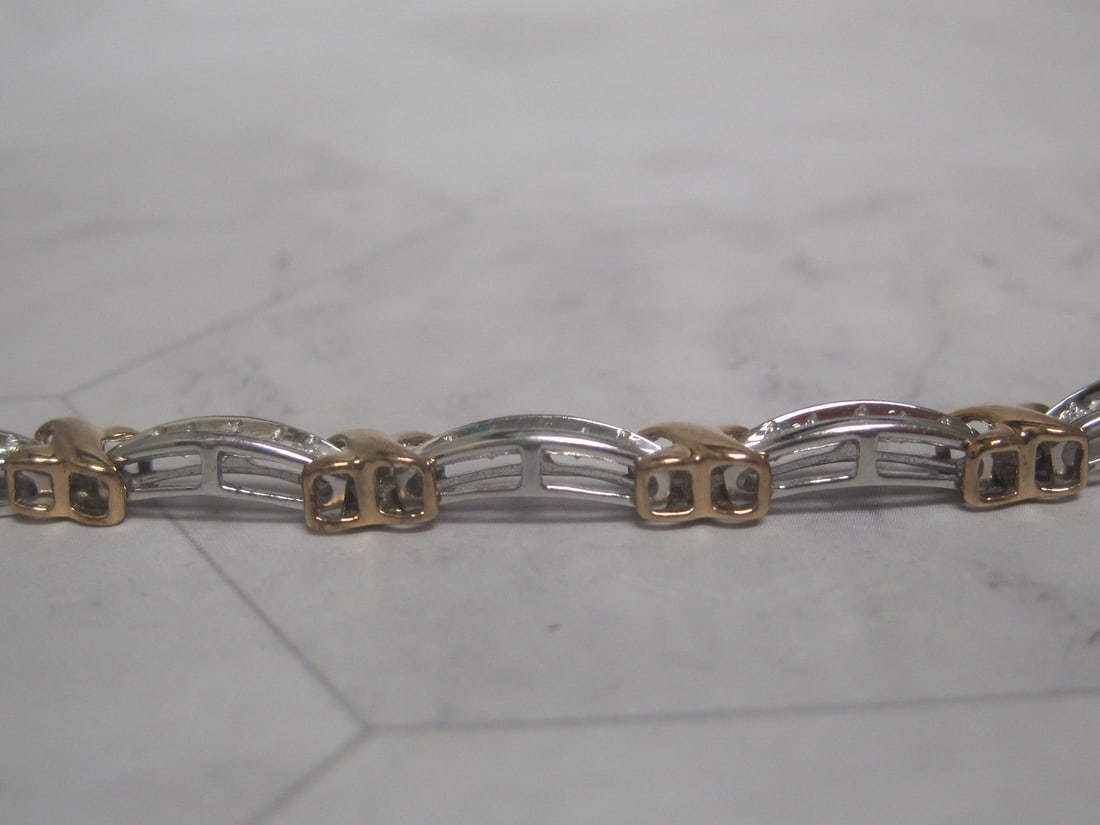 7 1/4" 10k White & Yellow Gold Diamond Bracelet appraised at $3000 - 4