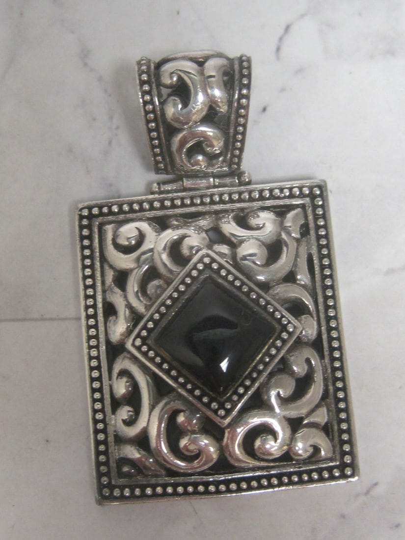 Sterling Silver Onyx Pendant: Weighs 31.2 grams
