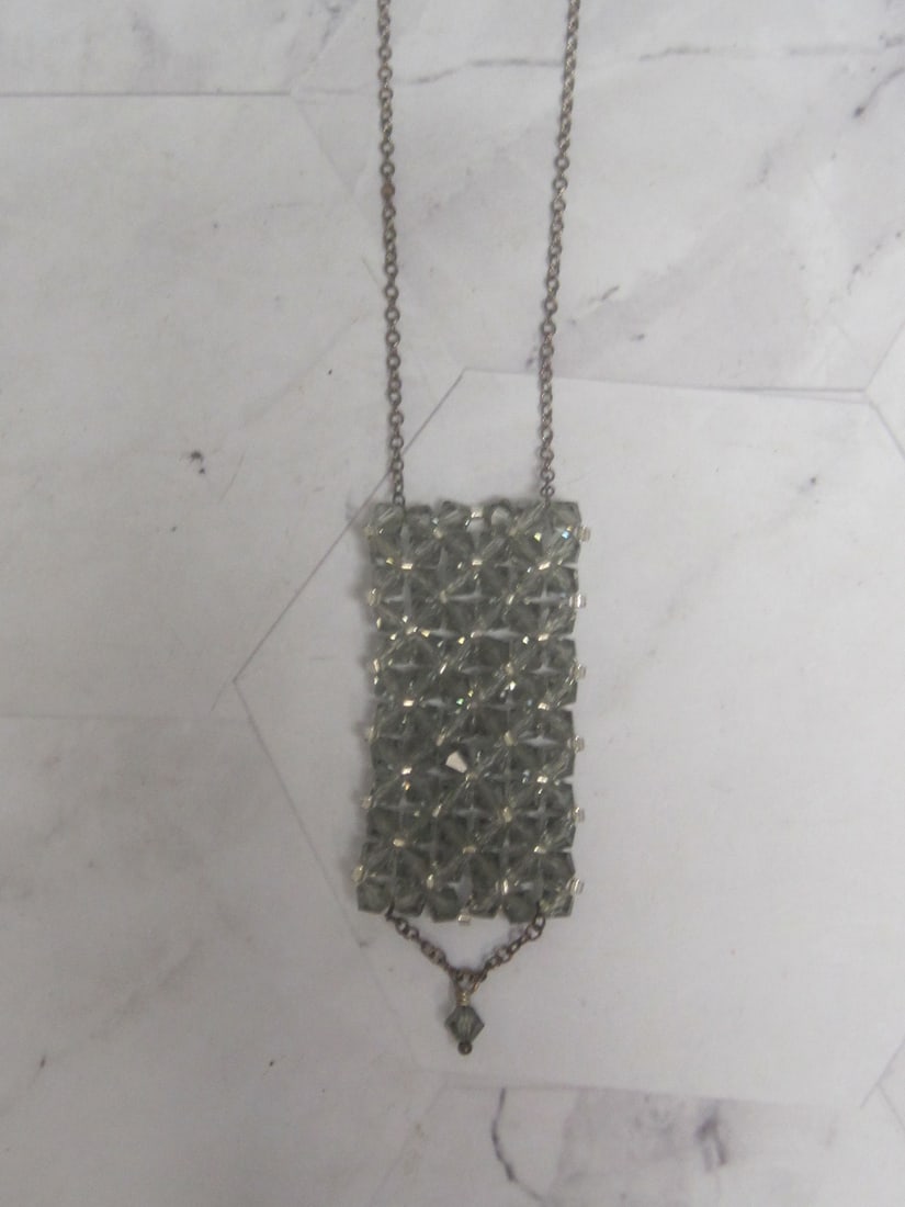18" Sterling Silver Necklace: Featuring unique mesh design crafted from smoky crystals