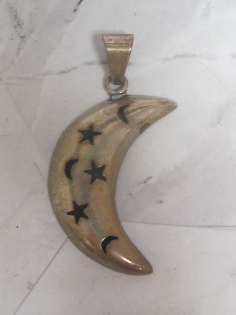 Sterling Silver Moon Pendant: Weighs 12.5 grams