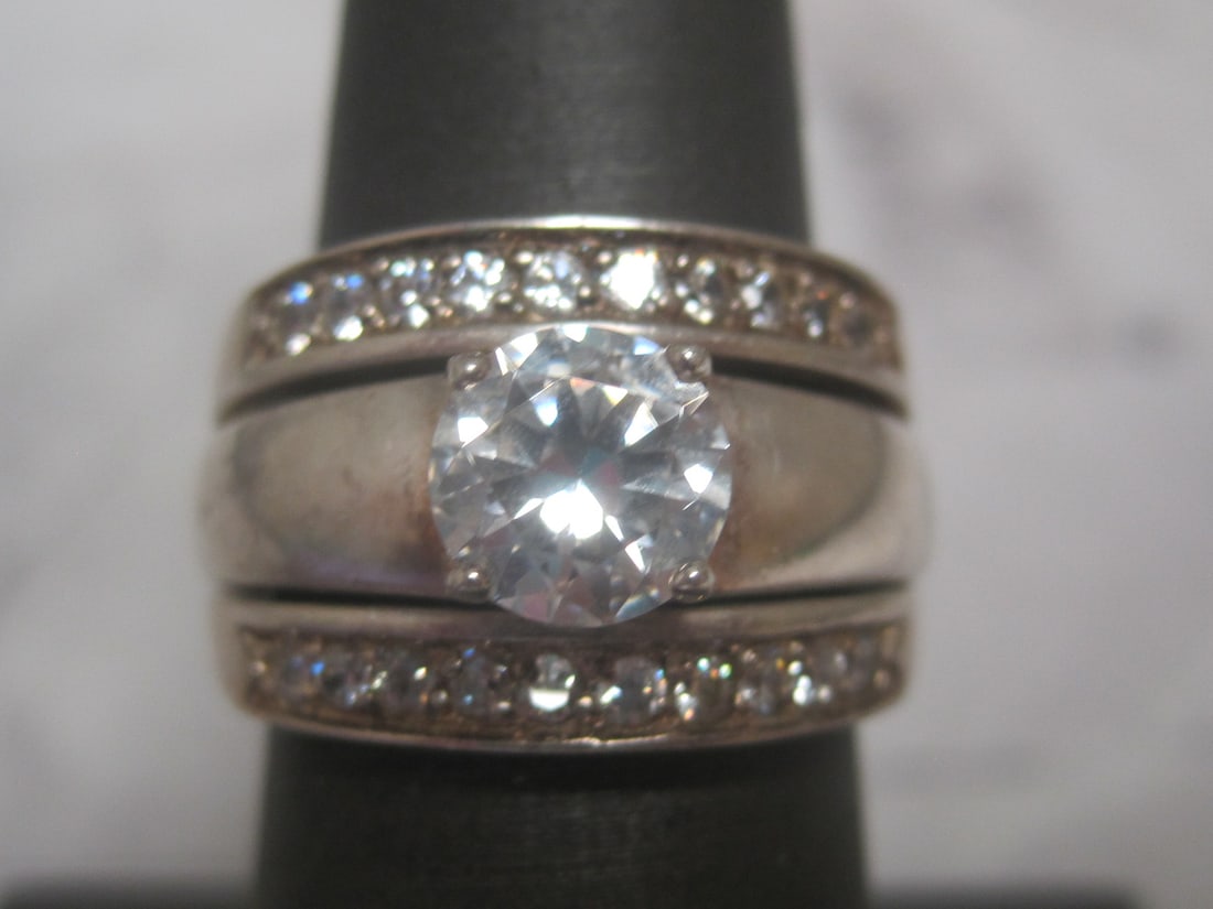 Sterling Silver Diamonique 3 Stack Ring: Weighs 10.8 grams, Size 7, Can be worn with or without jacket