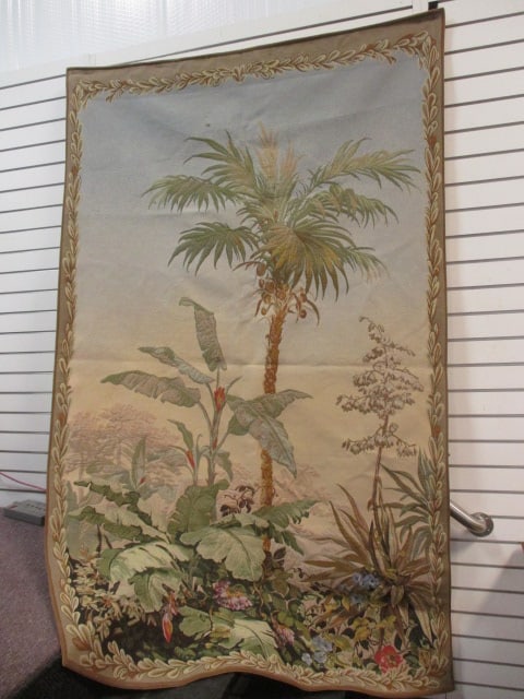 Halluin Tapestry Lush Tropical Scene with Central Palm Design: 49" x 80", makers mark in lower right corner "hal. with 3 lion crest on shield", French tapestry designed, made and woven in Flanders C Halluin