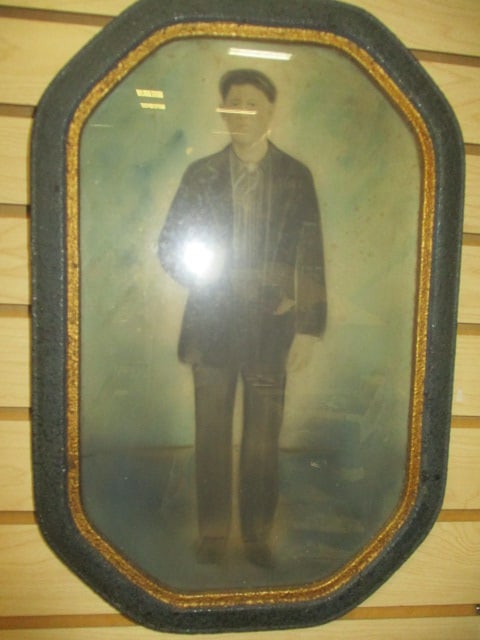 Circa 1990 Framed Antique Hand Colored Portrait of Working Man: 12" x 18", per consigner note "Pinkie Blinder" Type young man