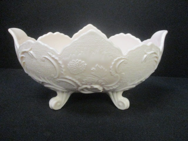 Circa 1950's Jeanette Pink Milk Glass "Lombardi" Footed Fruit Bowl: 10 1/2" x 6 1/2" x 5 1/4", dating and identification per consigner note