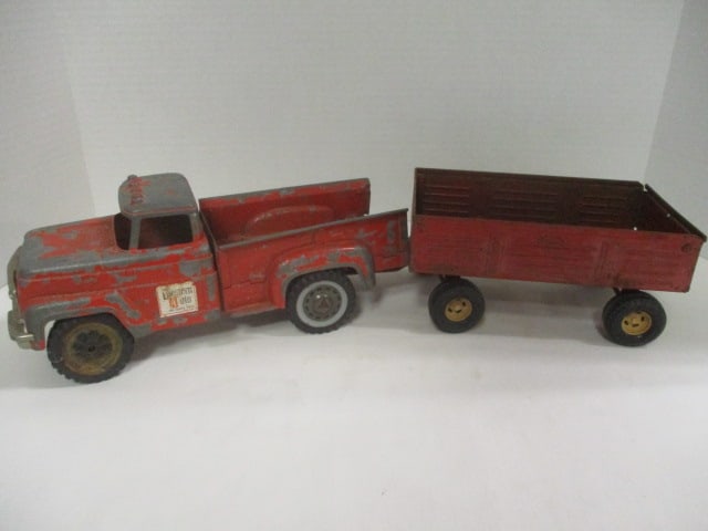 Vintage Hubley "Western Auto" Toy Truck and Ertel Trailer: both in played with condition