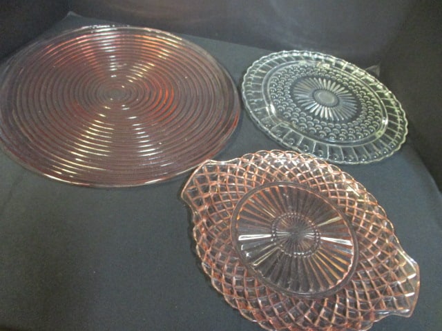 Two Pink Depression Glass Serving Tray and Clear Glass Footed Cake Plate: .