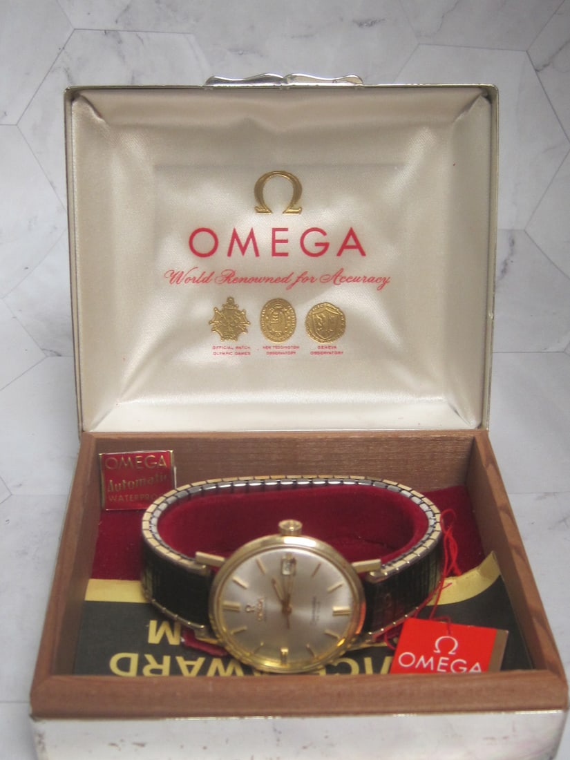Omega 1960's Automatic Seamaster Deville 14k Gold-Filled Watch: In original box, Runs, Has engraving on back, Has replacement stretch band