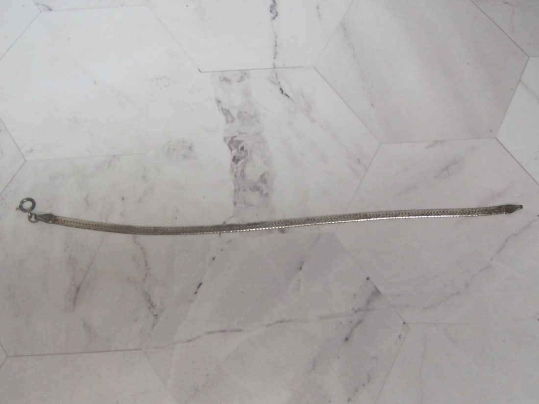 6 3/4" Sterling Silver Herringbone Bracelet: Weighs 2.9 grams