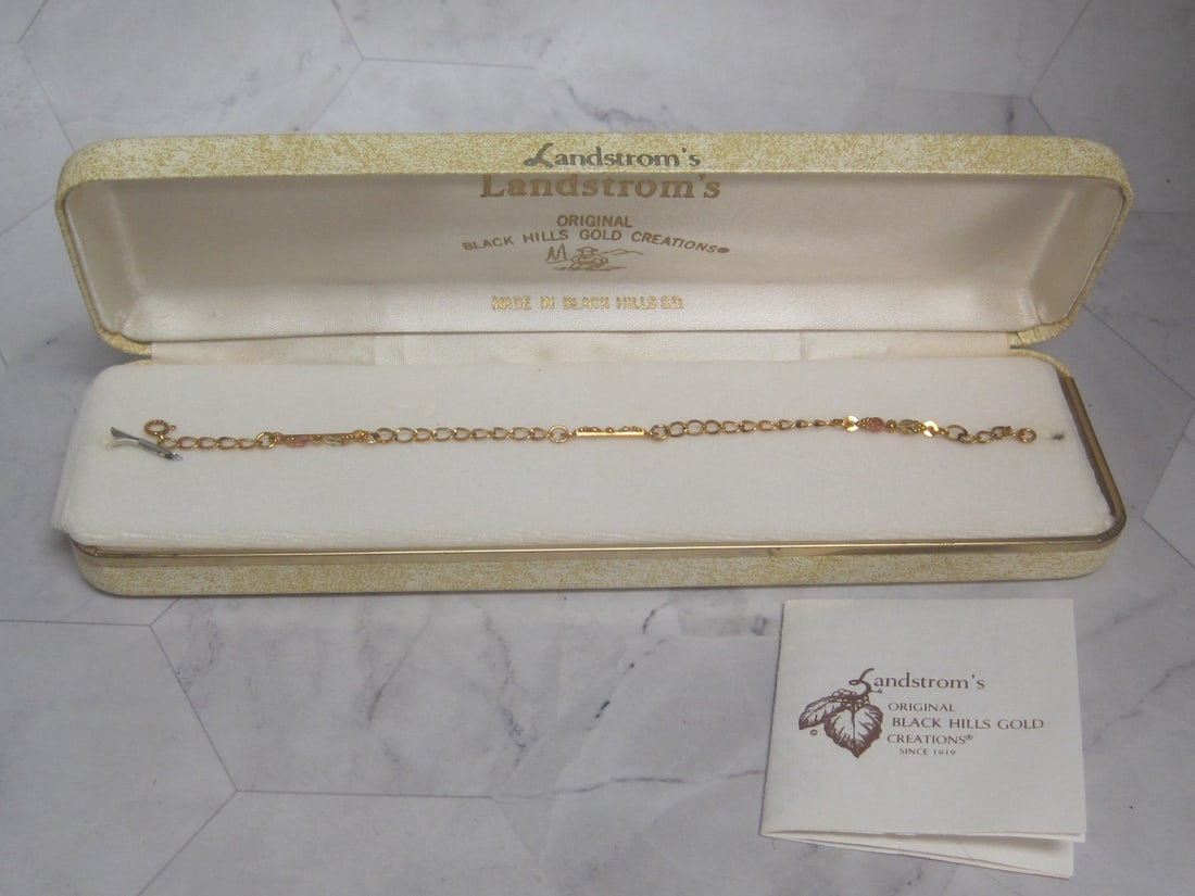7" Landstrom's Black Hills Gold Bracelet: Weighs 2.3 grams, 12k Gold leaves & 10k Gold grapes, In original box