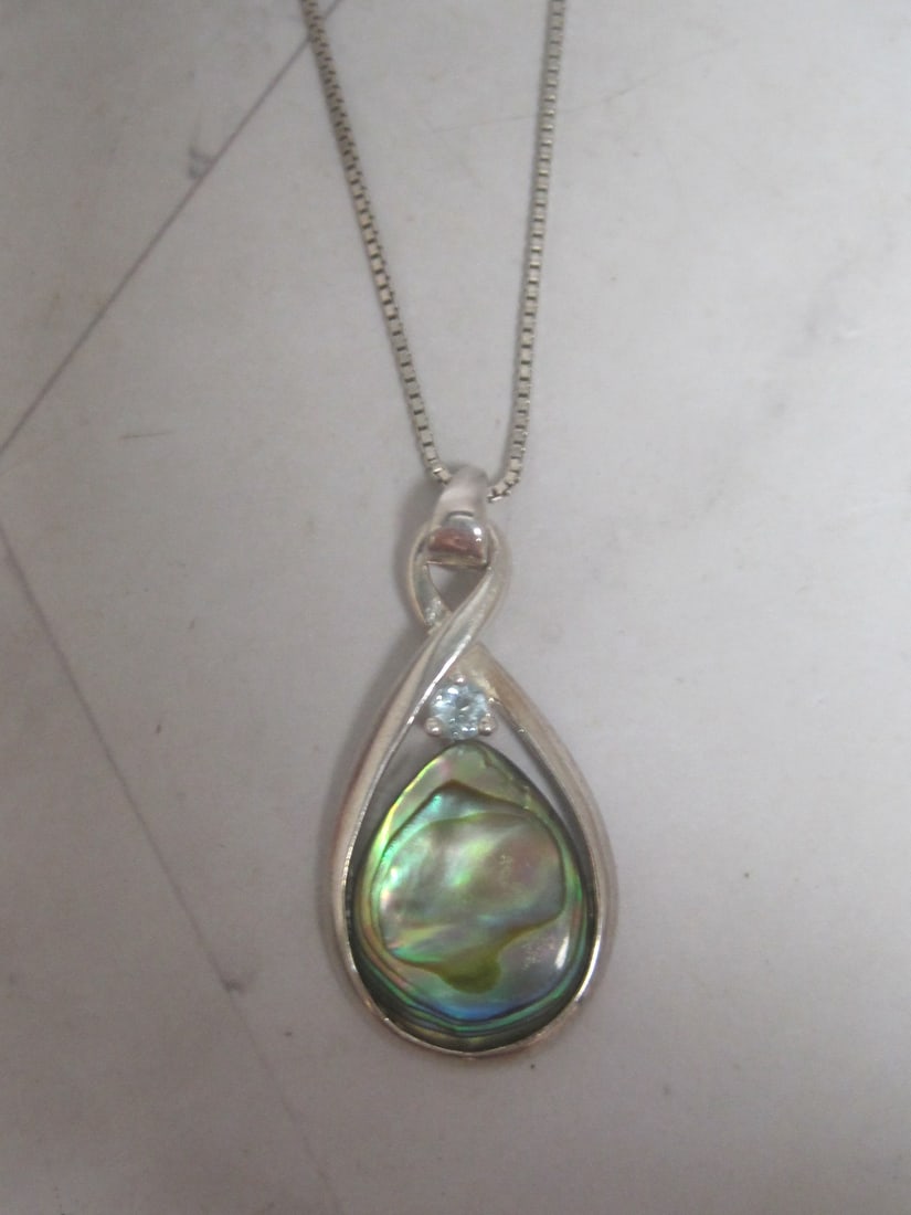 Sterling Silver Mother of Pearl Pendant on 18" Sterling Silver Chain: Weighs 4.5 grams