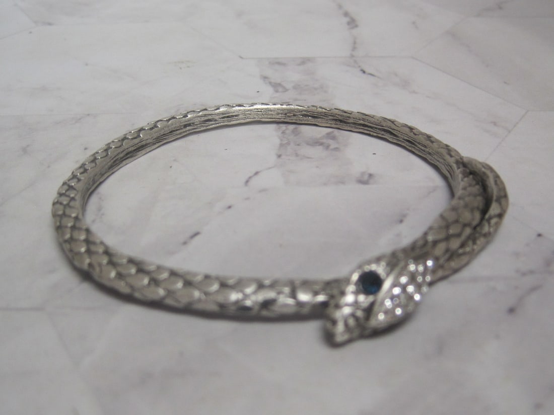 Silvertone Snake Bangle with Rhinestones: .