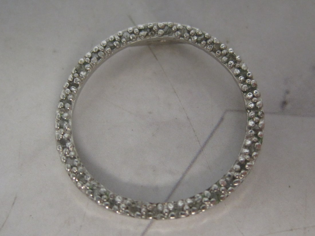 Sterling Silver Circle of Life Pendant with CZ Stones: Weighs 1.9 grams