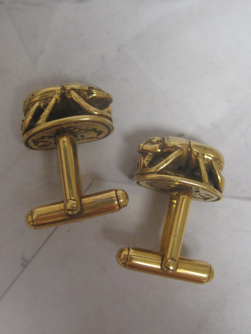 Goldtone Scarab Cufflinks: .