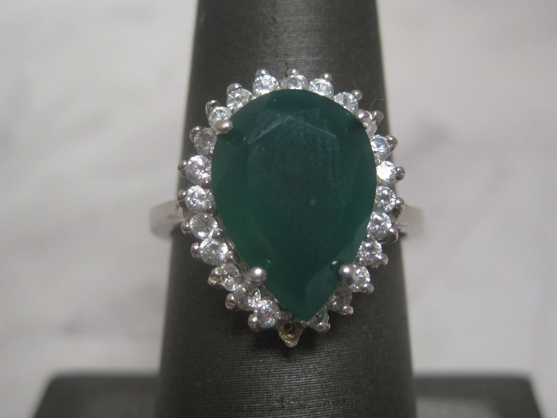 Sterling Silver Ring with Green & CZ Stones: Weighs 4.4 grams, Size 7, Missing 1 tiny stone on bottom