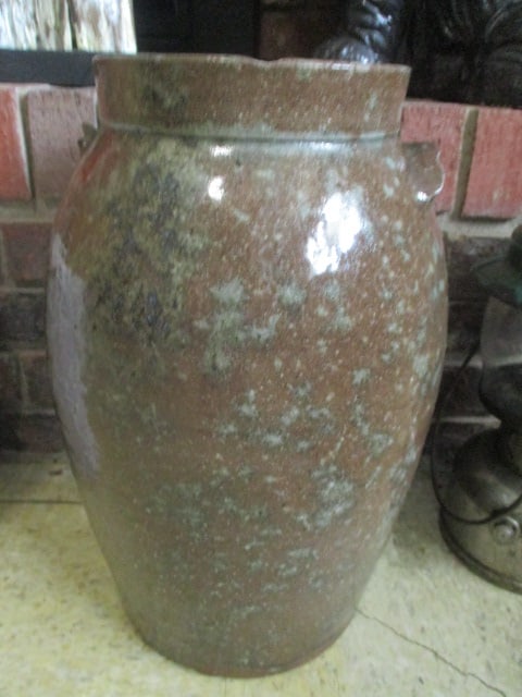 Vintage Brown Glazed 4 Gallon Churn with Lid: 16 1/2", has purple glaze that is possible potter's mark, applied finger hold is chipped and applied handle is broken off, some small chips on rim