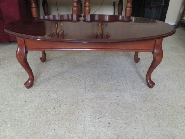 Oval Queen Anne Style Mahogany Grain Coffee Table: 45" x 26 3/4" x 16", few scuffs, Local Pickup Only