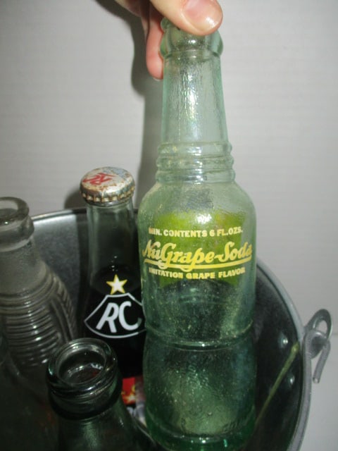 Five Old Soda Beverage Bottles in Tin Pail - 6