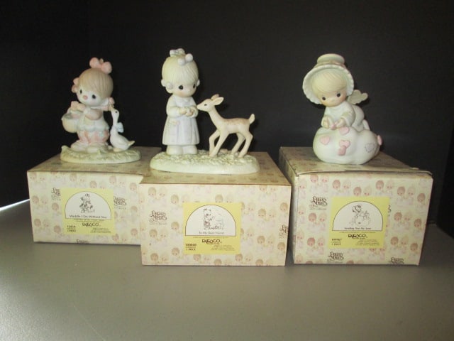 Three Enesco Precious Moments Figurines in Original Boxes: 1985 "Waddle I Do Without You" #12459, 1986 "To My Deer Friend" #10048 and 1987 "Sending You My Love" #109967
