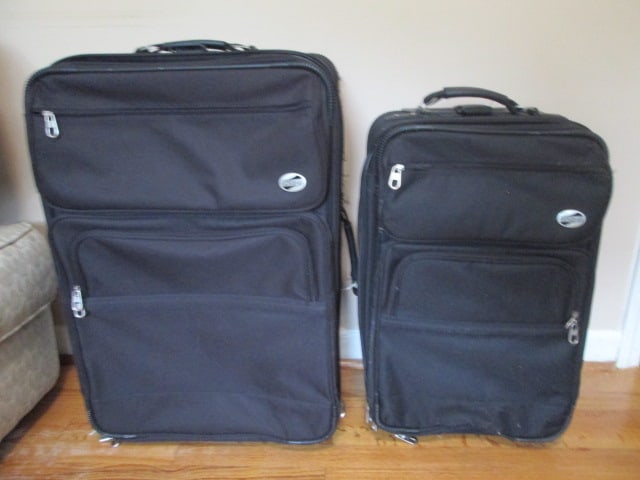 Two Black American Tourister Rolling Canvas Suitcases: some use wear and picks, Local Pickup Only