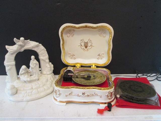 Musical Bisque Porcelain Nativity Scene and Mr. Christmas Jewel Box Symphonium Player: with Discs. Nativity 7 1/2"h, jewel box 8" x 7" x 3 1/2", player works